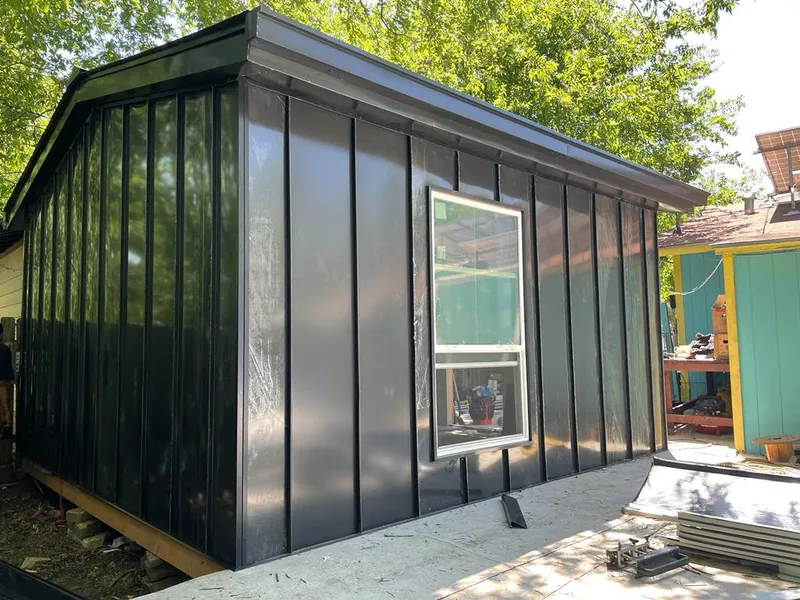 Black standing seam metal wall panels for Metal Roof Installation in Blackman